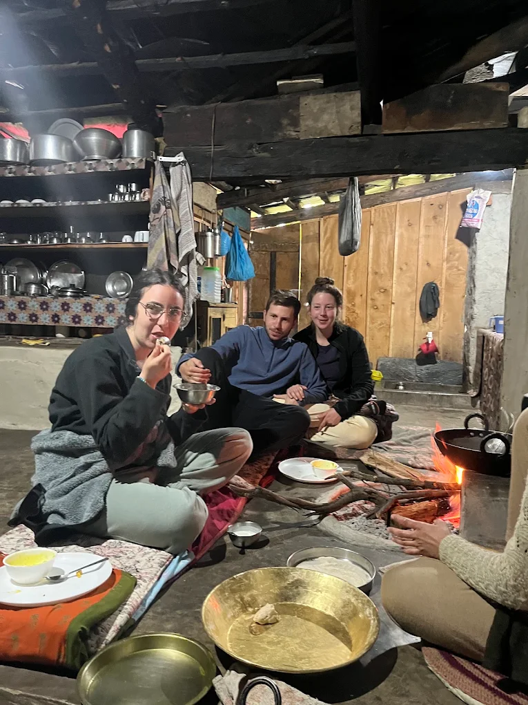 Guests sharing a meal in a Himalayan homestay